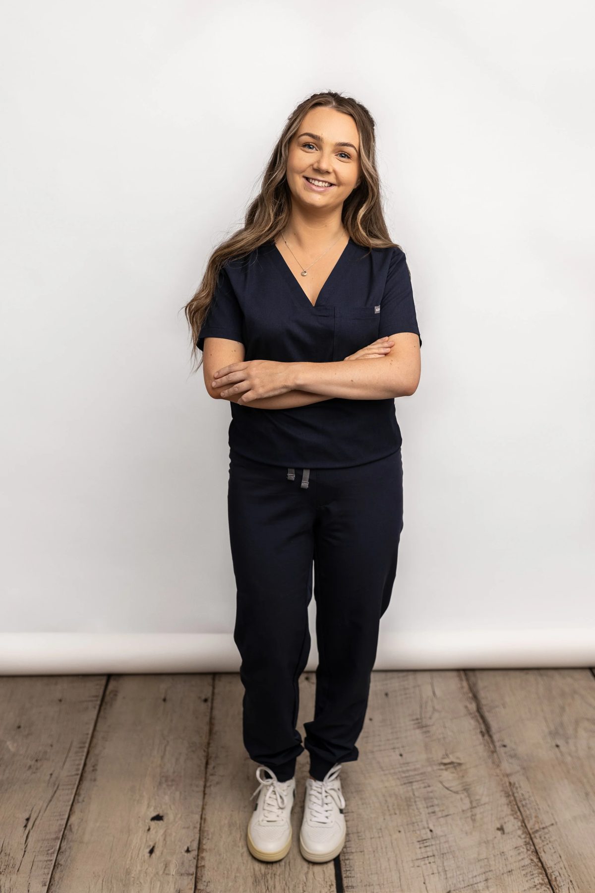 Georgina White, registered nurse and founder of The Face Workshop, standing with her arms folded